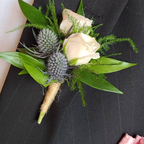 Double Sweetheart & Blue Thistle Boutonniere from Anthony's Florist in Laurel, MS