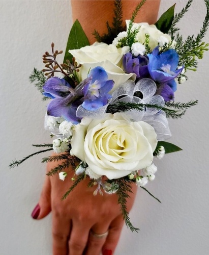 White Rose & Light Blue Delphinium Wristlet from Anthony's Florist in Laurel, MS